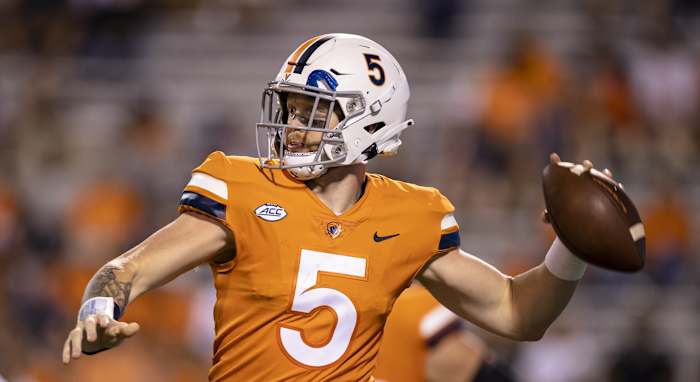 Virginia Cavaliers quarterback Brennan Armstrong (5) attempts a pass against William & Mary Tribe during the second half at Scott Stadium.